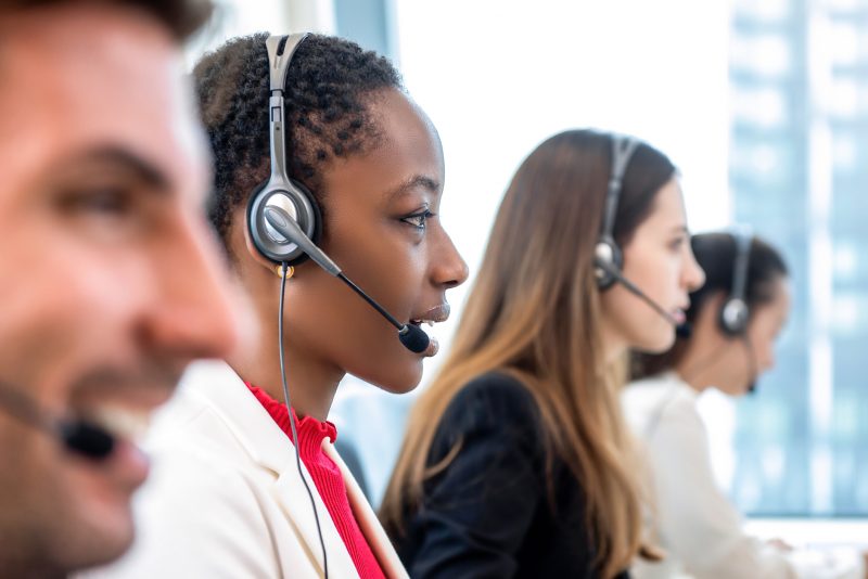 People working in a call centre talking to customers
