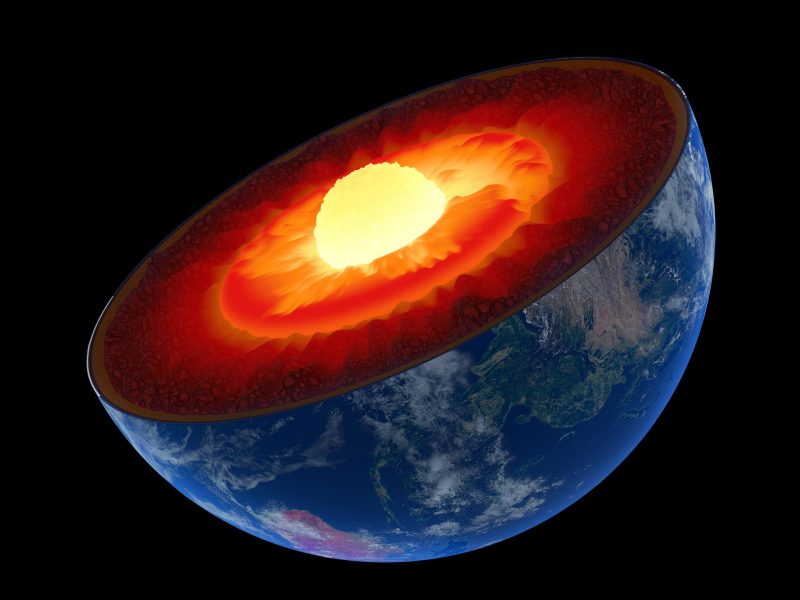 Earth cut in half with the core glowing against space