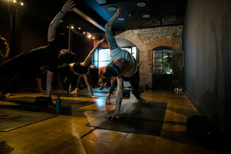 Yogand Yoga Studio in Bristol. The image shows people practising yoga